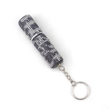 Detail showing the black and silver rhinestone pattern on a 10ml portable perfume bottle - Black Leopard