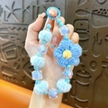 Cute blue knitted flower beaded phone strap with soft faux fur pom-poms and charms - Blue