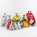 Variety set of festive Christmas drawstring gift bags in red, gold, and silver finishes - Grand Christmas Gift Bag Set