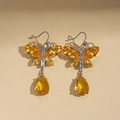 Detail of butterfly drop earrings with amber yellow crystals in silver-tone finish - Earrings (WN1503) / Yellow