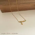 Minimalistische gouden titanium stalen bamboe ketting met verstelbare 42cm ketting - Bamboeblad Hanger