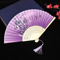 Elegant purple gradient folding fan with floral patterns and a matching purple tassel - Style 51