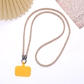 Rose gold rhinestone crossbody phone lanyard with yellow connector patch and grey metal rings - Champagne