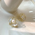 Elegant camellia stud earrings with white petals, pearl center, and gold metal accents - White Camellia Pearl Stud