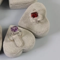 Silver square-cut red and purple rings with white zircon on a gray velvet tray - Heart-Shaped Ring Stand