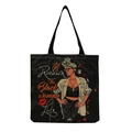 Detail of black canvas tote bag featuring Rockin The Black Woman Life illustration - Black Style-Afro Lady Portrait-Rockin Slogan