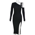 Detail of the chic black knit dress with unique feather trim and elegant one-shoulder cut - S / Black
