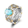 Elegant two-tone S925 silver ring featuring light blue oval gemstone and hollow carvings - Lzr34-6