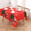 Christmas tablecloth with red festive prints of Santa Claus and trees on a wooden table - 29 / 152cm*220cm