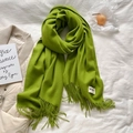 Soft grass green cashmere-feel scarf with fringes on a clean white fabric backdrop - 200*65cm / Verdant Green