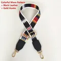 Detail of colorful zigzag woven strap with black faux leather and gold metal swivel hooks - Colorful Waves Black Leather Gold Hook