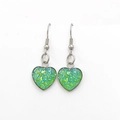 Macro detail of heart-shaped earrings with green glitter finish and silver metal hooks - Green (Color 2)