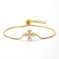 Detailed view of gold cross bracelet with cubic zirconia inlay and adjustable box chain - Style 9