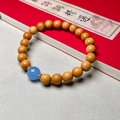Yellow sandalwood beads bracelet with turquoise stone and sparkling metal spacers - Sandalwood 8mm with Aquamarine Style Bead