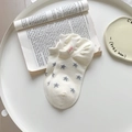 Creamy white cotton ankle socks with grey star patterns and pink MINI tag detail - One Size / White