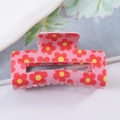 Pink rectangular claw clip featuring vibrant red floral patterns for women's hair styling - Bright Pink Floral