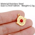 Gold stainless steel sun pendant with a red gemstone, 17mm circular design - DY792-1 Sunburst Red Stone