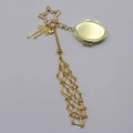 Polished gold alloy handbag pendant featuring a star carabiner and metal mesh chain - Gold Oval Set (9 Layers)