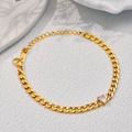 Bracciale a catena cubana dorata con zircone a cuore e chiusura a moschettone chic - Oro (B297)