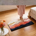 Plush bathroom mat with 3D mountain landscape design in sunset color gradient - Gold Wave Style