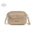 Minimalist apricot pebbled leather crossbody phone bag with front snap pocket and strap - Apricot