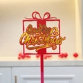 Detail of red and gold acrylic Merry Christmas cake topper in gift box shape - Red Gold Gift Box 1 Merry Christmas
