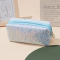 Fashionable light blue sequined pencil case with pearl zipper and shimmering vertical stripes - Blue
