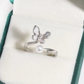 Detail of the butterfly pearl ring with pink enamel in a luxury green jewelry box - Gradient Pink Enamel Butterfly (White Gold Color 6)
