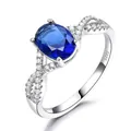 Vintage 925 sterling silver ring featuring oval blue sapphire and pavé twisted band - Size 5 / Oval Intertwined Style (RUJ099S-1) / Dark Blue