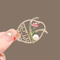 Elegant gold fan-shaped brooch with pink enamel flowers and a white pearl accent - Orchid