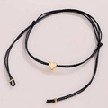 Bracelet ajustable en corde tressée noire avec un délicat pendentif cœur doré - Noir