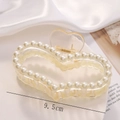 Detail of 9.5cm heart hair claw clip with white pearls on a silk background - S217-6# Heart Shaped Pearl Claw
