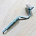Blue curved cleaning brush with white bristles and hanging hole on marble surface - V-shaped Toilet Brush / Nordic Blue