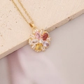 Detailed close-up of a golden flower pendant with colorful zircons on a silk background - Zircon Flower Style (7#)