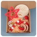 Baby gift set with star silicone teether, wooden pacifier clip, and dummy in a wooden box - Red