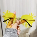 Frameless yellow teardrop sunglasses with unique liquid drip design and gold metal arms - Gold Frame Yellow Lenses