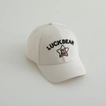 Close-up of cotton baseball cap featuring Luckbear bear embroidery and star details - 50-52cm 1-5 Years / Off White