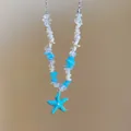 Detail of starfish charm necklace with blue stone beads and white pearls for summer beach wear - Style 9-Silver-Blue (Large Starfish Gravel)