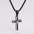 Detail shot of a black and silver double-layered cross pendant on a woven chain necklace - Small / Steel Color/Black