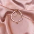 Elegant natural freshwater pearl bracelet with gold lobster clasp and adjustable chain - Gold Bead Bracelet