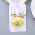 Glittery gold and iridescent yellow star hair clips for girls on a white display card - Iridescent Yellow Set