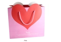 Bolsa de regalo de papel rosa con gran corazón rojo y texto Love con asas de cuerda - Mediano / Rosa