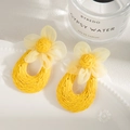 Handmade raffia hoop earrings with yellow mesh flower for bohemian summer vacation style - Yellow