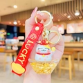 Lucky cat liquid sand keychain with gold flakes inside a clear charm and red strap - Fortune Cat Ingot Quicksand-Gold Foil