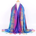 Detail of retro jacquard scarf showing colorful floral patterns and fringe edges - Rose Royal Blue