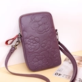 Purple embossed flower mobile phone bag in pebble leather with adjustable cross body strap - Purple