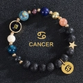 Solar system bead bracelet with lava rock and Cancer zodiac sign golden charm - Cancer