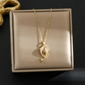 Elegante collar de delfines en acero de titanio dorado con circonitas para mujer - Oro-Doble Delfines