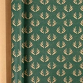 Dark green Christmas wrapping paper roll featuring metallic gold antler pattern - Christmas Series - Antlers