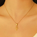Detail of 18k gold plated stainless steel Ankh cross necklace worn by a model - 18K Real Gold 4205 Hollow Ankh Cross Necklace